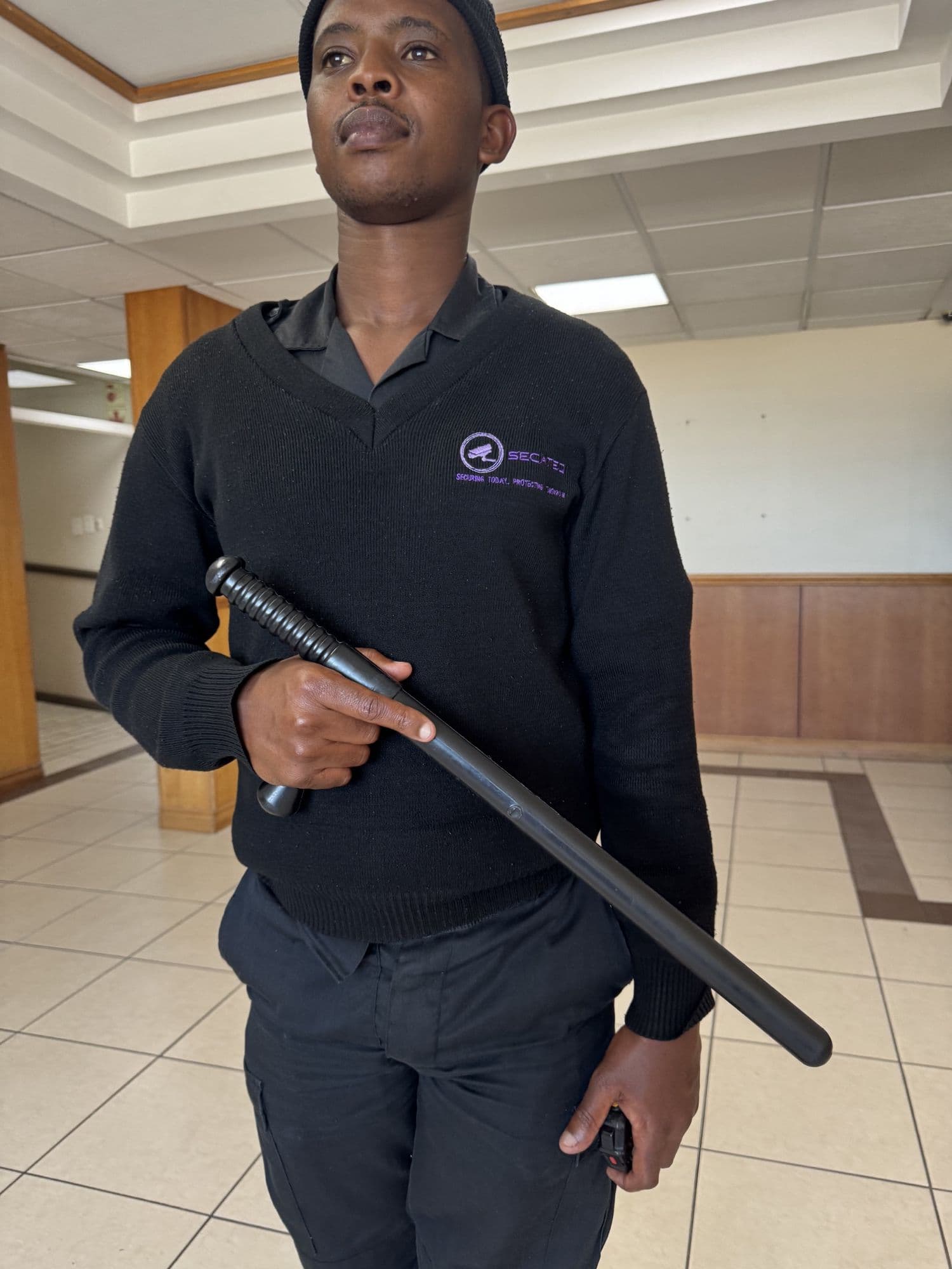 A SecaTeq officer on his rounds inside a building